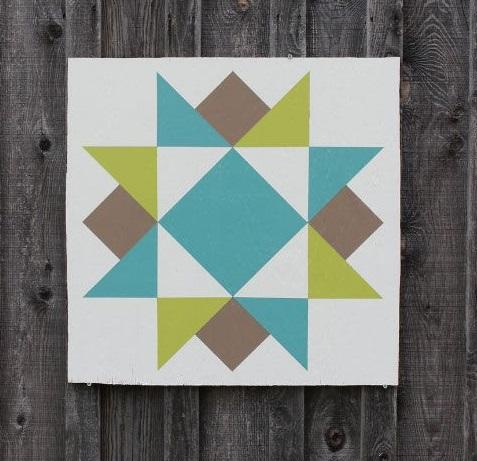 small wooden painted barn quilt