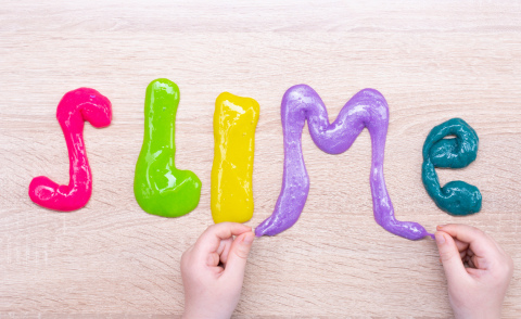 Letters to spell out SLIME in pink green yellow purple turquoise