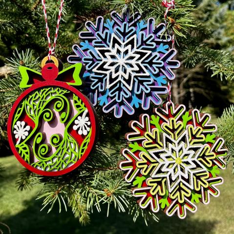 multi layered painted wood snowflakes ornament and round wood ornament