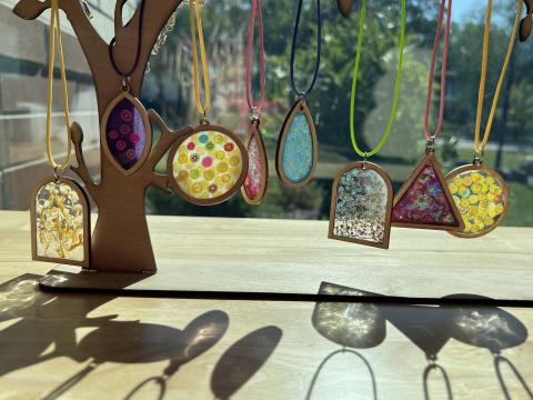 various laser cut shapes filled with resin and decorations