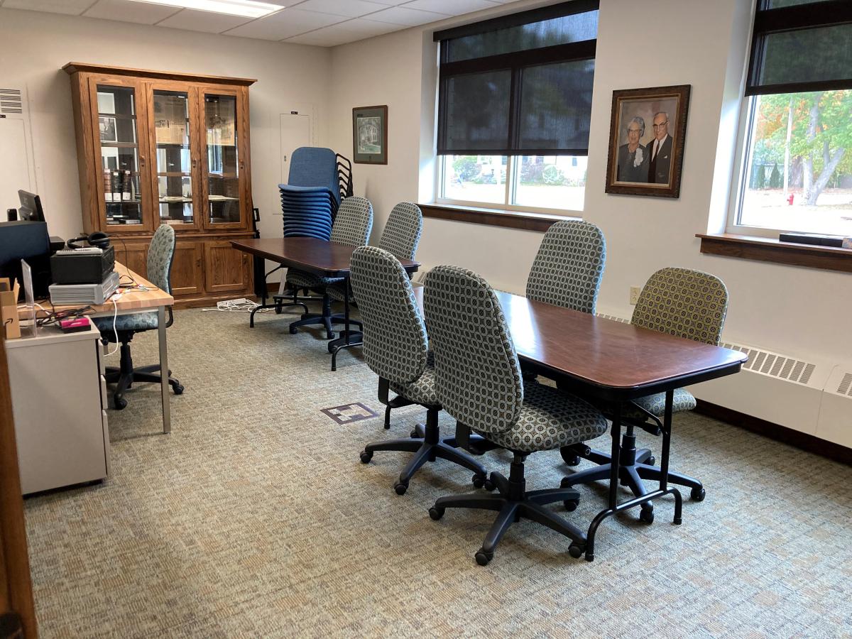 chairs around in a table in history room